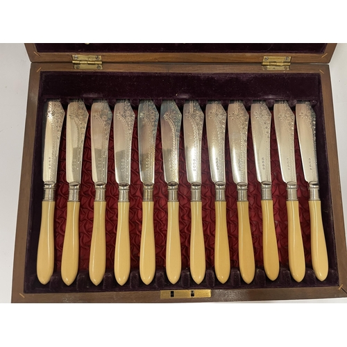 40 - A VINTAGE CASED SILVER PLATED CUTLERY SET