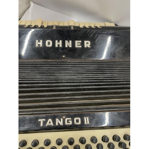 6 - A VINTAGE HOHNER TANGO II ACCORDIAN