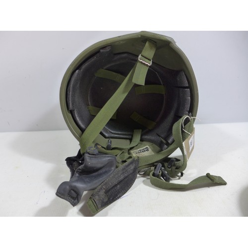 306 - A GREEN NATO HELMET AND LINER DATED 1996