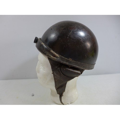 309 - A MILITARY TANKERS HELMET AND LINER, THE INSIDE MARKED PRODUCTION STAR HOLLYWOOD DEPOSE FRANCE