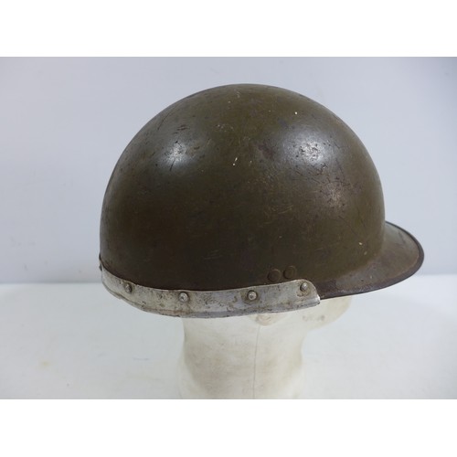 310 - A WORLD WAR II NAZI GERMANY GREEN PAINTED METAL LUFTSCHUTZ HELMET