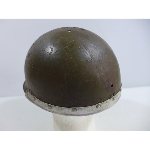 310 - A WORLD WAR II NAZI GERMANY GREEN PAINTED METAL LUFTSCHUTZ HELMET