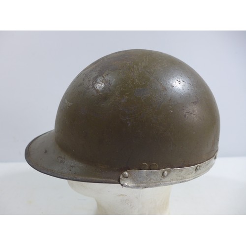 310 - A WORLD WAR II NAZI GERMANY GREEN PAINTED METAL LUFTSCHUTZ HELMET