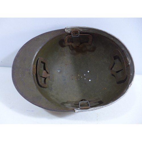 310 - A WORLD WAR II NAZI GERMANY GREEN PAINTED METAL LUFTSCHUTZ HELMET