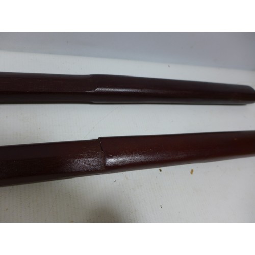 311 - TWO JAPANESE HARDWOOD BOKKEN, LENGTH 98CM