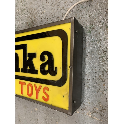 301A - A TONKA TOYS ILLUMINATED LIGHT BOX SIGN 63CM X 32CM