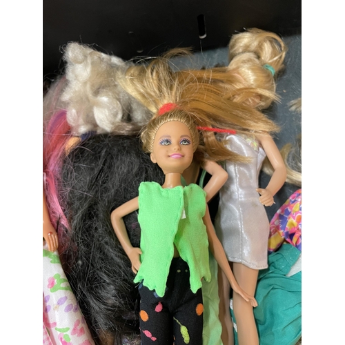 405 - TWELVE VINTAGE DRESSED BARBIE DOLLS