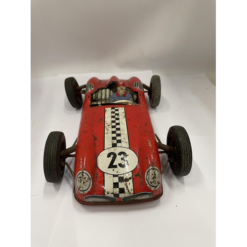 408 - A TIN PLATE RACING CAR WITH DRIVER