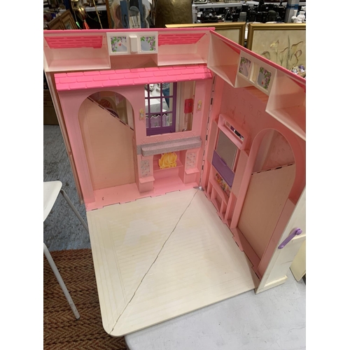 391 - A BARBIE HOUSE AND DOLLS