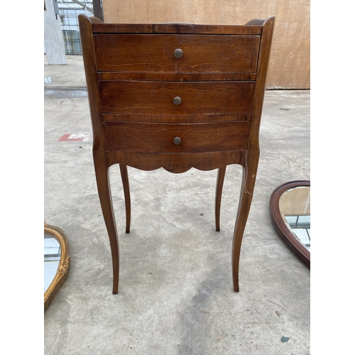 2795 - A CONTINENTAL MARQUETRY CROSSBANDED BEDSIDE TABLE ENCLOSING THREE DRAWERS