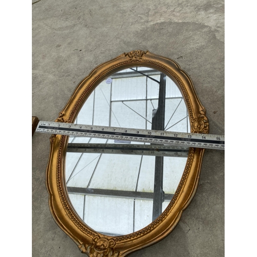 2796 - AN OVAL MODERN GILT FRAMED WALL MIRROR BY GALLERY FRAMING, 20X14