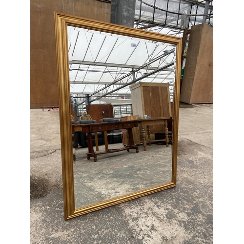 2800 - A LARGE MODERN GILT FRAMED BEVEL EDGED WALL MIRROR, 52 X 40