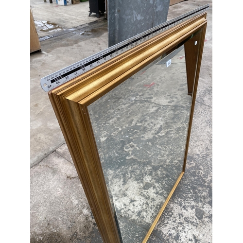 2800 - A LARGE MODERN GILT FRAMED BEVEL EDGED WALL MIRROR, 52 X 40