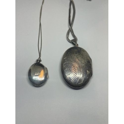 553 - TWO SILVER LOCKETS ON CHAINS