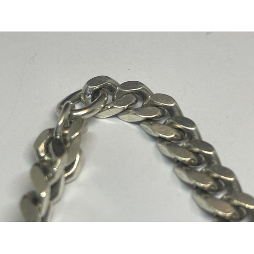 562 - A SILVER ID BRACELET