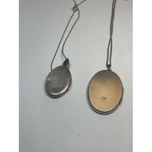 565 - TWO SILVER LOCKETS ON CHAINS