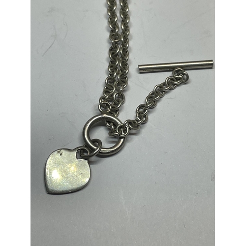 570 - TWO SILVER T BAR NECKLACES WITH HEART CHARMS