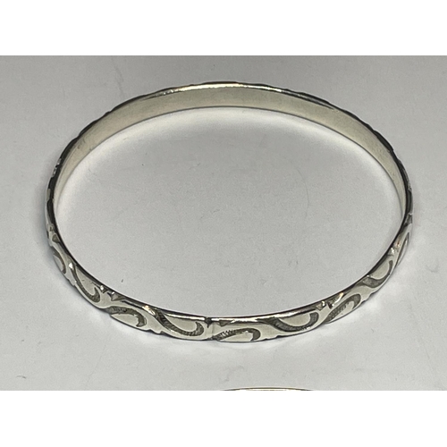 572 - TWO SILVER BANGLES