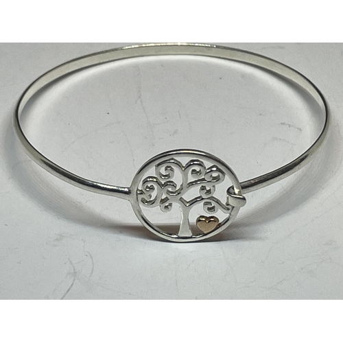 572 - TWO SILVER BANGLES