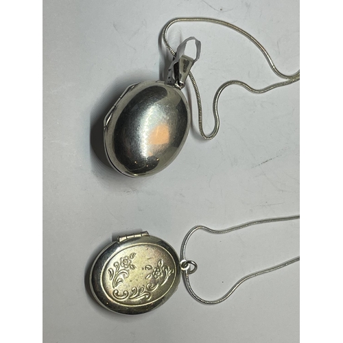 577 - TWO SILVER LOCKETS WITH CHAINS