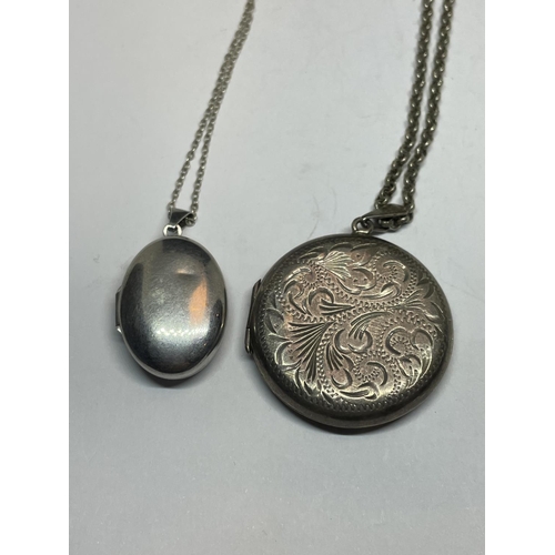 584 - TWO SILVER LOCKETS WITH CHAINS