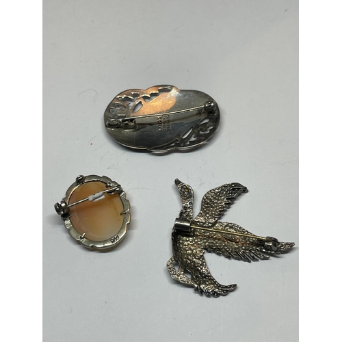 605 - THREE SILVER BROOCHES