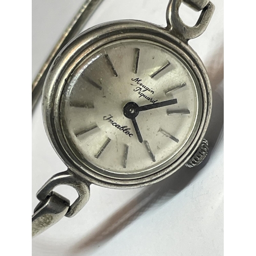 609 - A VINTAGE SILVER WRIST WATCH