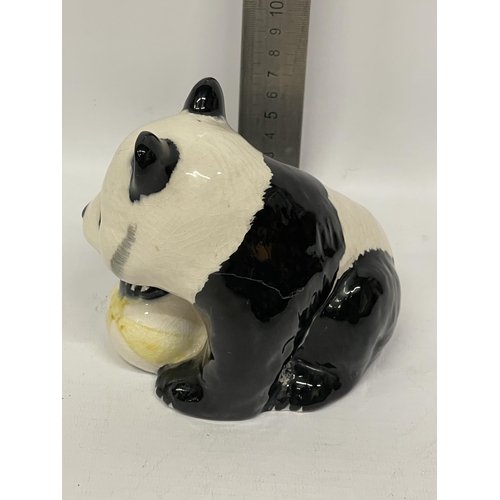 725 - A BESWICK PANDA WITH A BALL