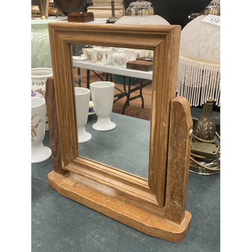 173 - A VINTAGE PINE DRESSING TABLE MIRROR