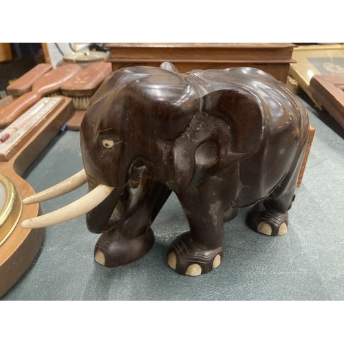 182 - A MIXED LOT OF WOODEN WARE AND TREEN ITEMS, BOXES, EDISON STOCK TICKER, WOODEN ELEPHANT, BAROMETER E... 