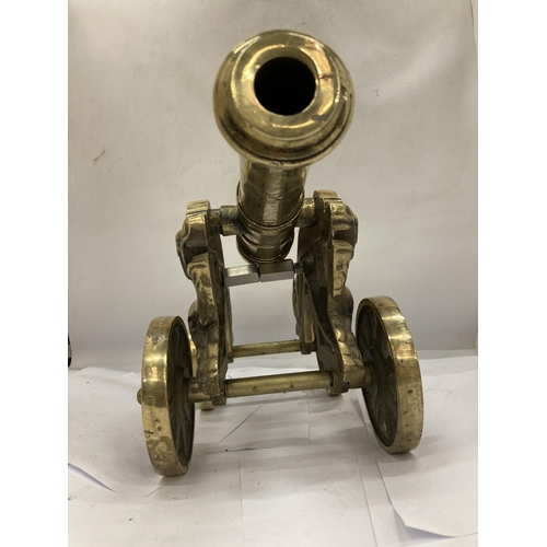 11 - A VINTAGE BRASS MODEL OF A CANNON