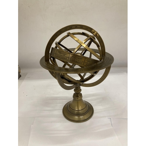 22 - A BRASS DESK REVOLVING GLOBE STYLE COMPASS WITH BIRTH SIGNS