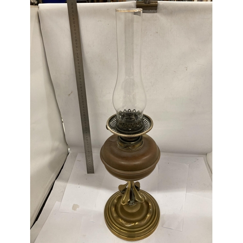 31 - A VINTAGE BRASS AND COPPER OIL LAMP