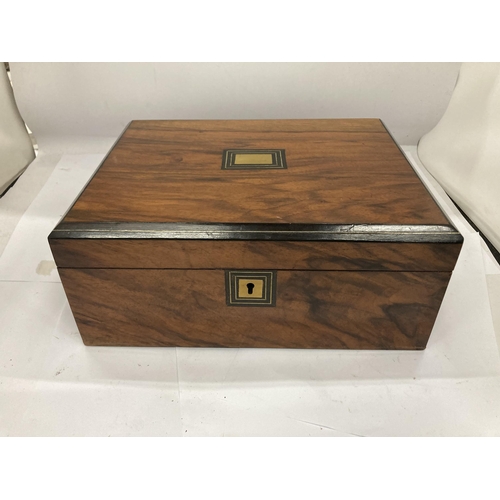 32 - A VINTAGE WALNUT JEWLLERY BOX WITH INNER LIFT OUT SECTION AND KEY
