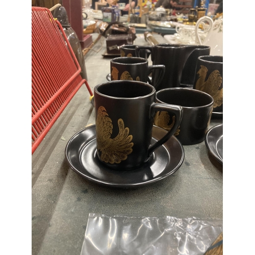 210 - A PORTMEIRION BLACK AND GOLD PART COFFEE SET