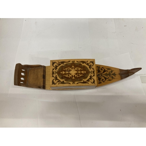 228 - AN INLAID DESIGN CIGARETTE HOLDER/MUSIC BOX