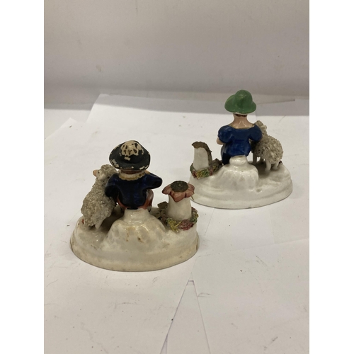 232 - A PAIR OF VINTAGE STAFFORDSHIRE FIGURE WITH SHEEP