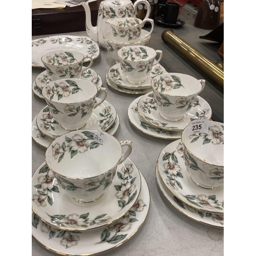 235 - A FLORAL BONE CHINA TEASET