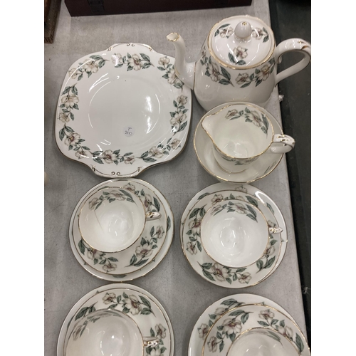 235 - A FLORAL BONE CHINA TEASET