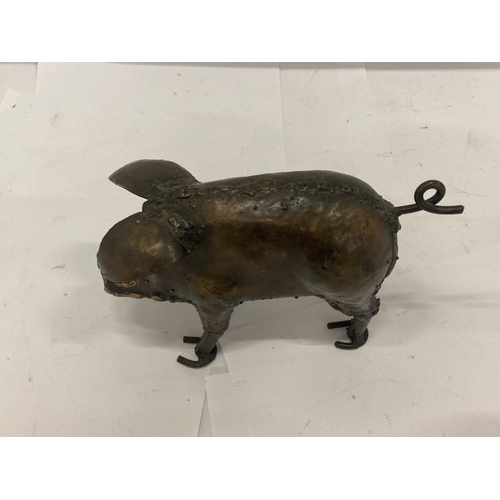 239 - A HAND SCULPTED METAL PIG, HEIGHT 12CM