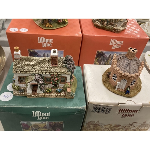 243 - A GROUP OF EIGHT BOXED LILLIPUT LANE COTTAGE MODELS