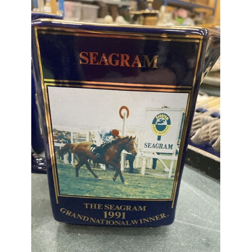 272 - TWO MARTELL COGNAC WATER JUGS FEATURING GRAND NATIONAL WINNERS 'PAPILLON' (2000) AND 'SEAGRAM' (1991... 