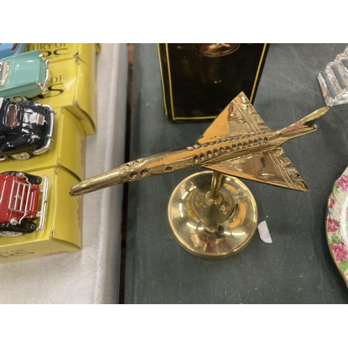 292 - A BOXED BRASS MODEL OF A CONCORDE AEROPLANE