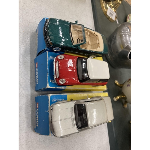 293 - THREE BOXED CORGI 'A CENTURY OF CARS' TO INCLUDE A BMW 3 SERIES, A BMW 2002 TURBO AND A MINI