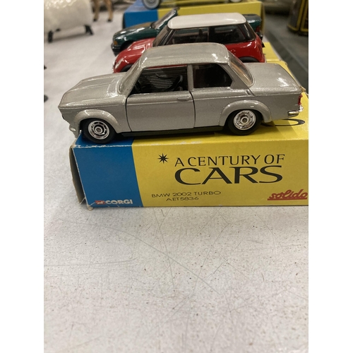 293 - THREE BOXED CORGI 'A CENTURY OF CARS' TO INCLUDE A BMW 3 SERIES, A BMW 2002 TURBO AND A MINI