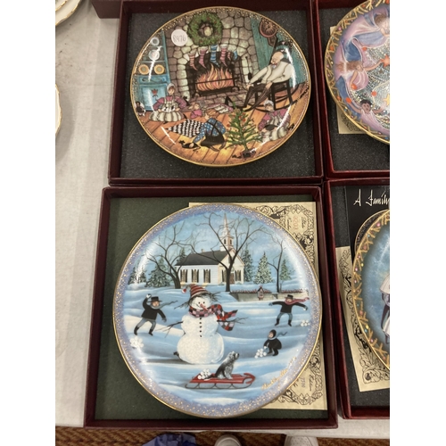 299 - A GROUP OF SIX BOXED A FAMILY CHRISTMAS CABINET PLATES