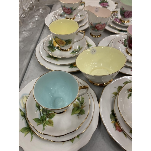 300 - A COLLECTION OF FLORAL DESIGN BONE CHINA TRIOS