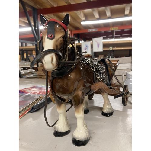 1004 - A CERAMIC SHIRE HORSE WITH WOODEN CART