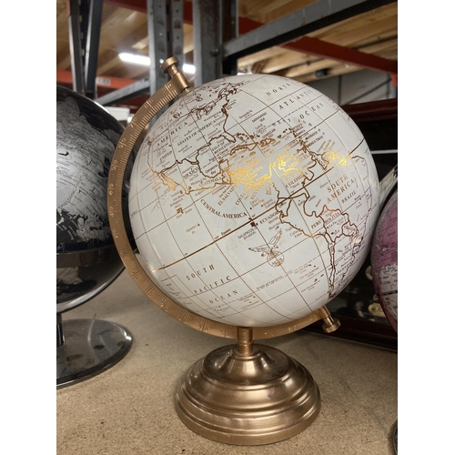 1010 - A GROUP OF THREE MODERN GLOBES