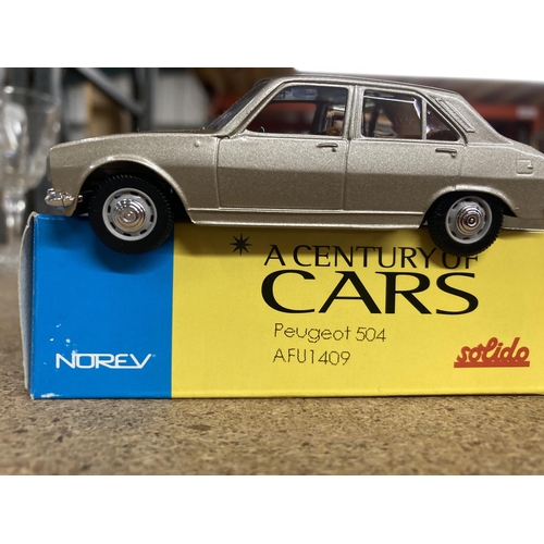 1015 - FOUR BOXED CORGI 'A CENTURY OF CARS' TO INCLUDE A PEUGEOT 504, 403 CABRIOLET, 806 AND 203